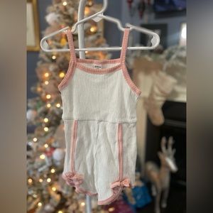 White and pink bodysuit